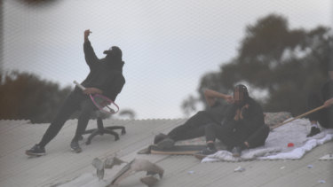 Detainees are seen during a riot at the Frank Baxter Juvenile Justice Centre, Kariong, on Monday.