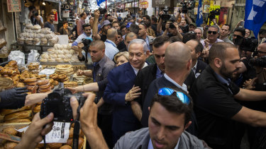 Prime Minister Benjamin Netanyahu of Israel visits the markets in Jerusalem as part of his election campaign.