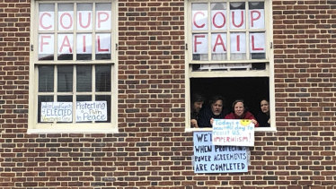 Despite their dwindling numbers and no power, activists vow to stay inside the Venezuelan embassy in Washington.