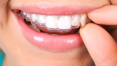 Investigation Launched Into Marketing Of Clear Teeth Straighteners