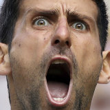 Djokovic lets out a scream during his men’s singles semi-final at Wimbledon in 2019.