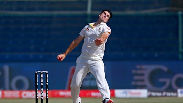 Pat Cummins bowls on day five of the second Test against Pakistan in Karachi. 
