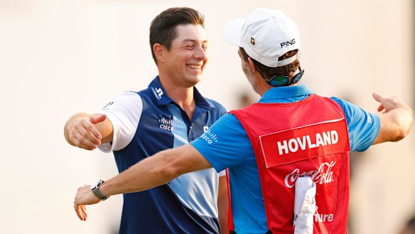 Viktor Hovland and Shay Knight celebrate the Tour Championship win.