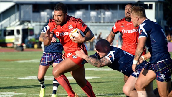 Strife: Tonga's Peni Terepo breaks the Scottish line during the 2017 Rugby League World Cup.