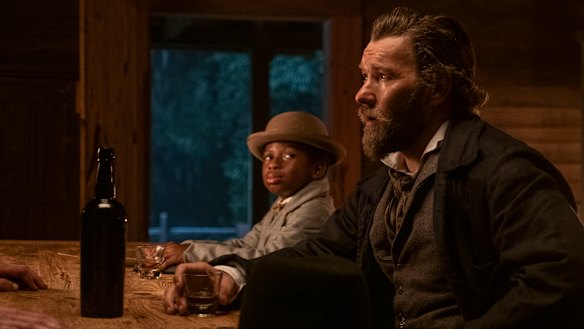 Chase Dillon as Homer and Joel Edgerton as Ridgeway in The Underground Railroad.