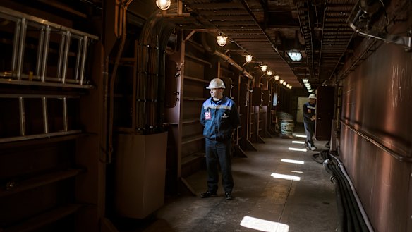 Technical staff in the corridors on the ground floor of the Akademik Lomonosov.