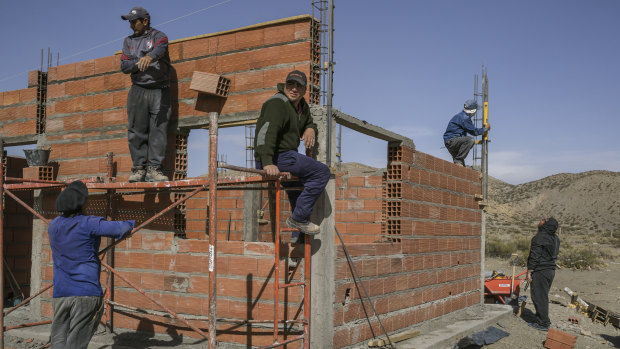 Workers at a housing site in Bajada del Agrio, Argentina, the closest town to the Chinese space station.