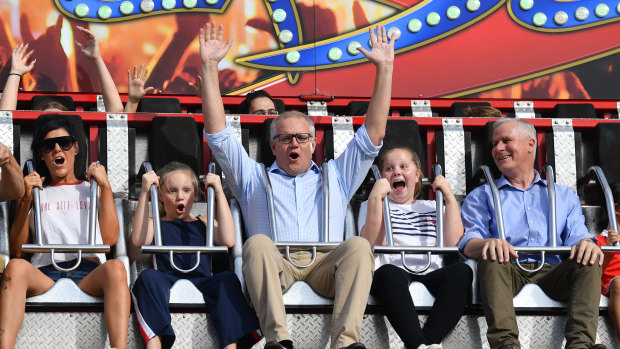 Prime Minister Scott Morrison with daughters Lily, Abbey and Deputy Prime Minister Michael McCormack at the 2019 Royal Easter Show. 