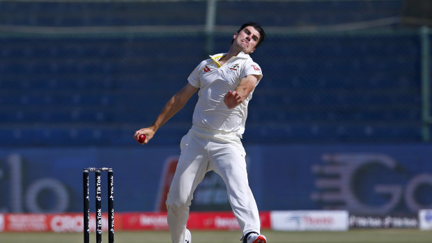 Pat Cummins bowls on day five of the second Test against Pakistan in Karachi. 