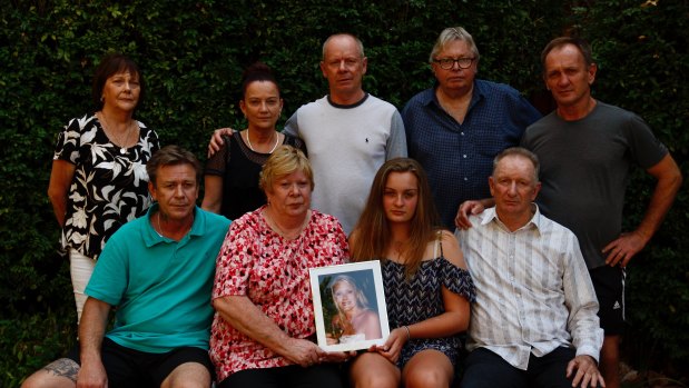 Tammy Peters' family want to tell her story. From left to right (front row) Ray Brennan, Sharon Piper, Bree Peters, Ray Brennan. (Back row) Jennifer Dixon, Kelly Brennan, Steve Brennan, Darrell Piper, Keith Brennan.