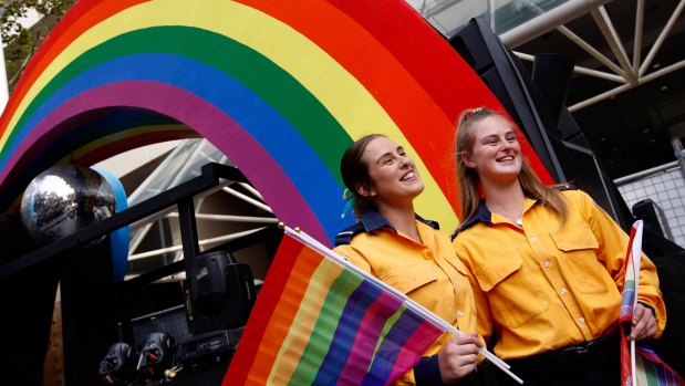 Sisters Gabrielle and Katherine Tanks from the North Rocks Rural Fire Service attend their first Mardi Gras.