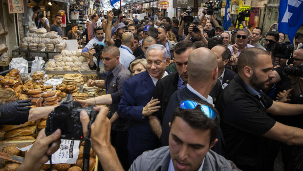 Prime Minister Benjamin Netanyahu of Israel visits the markets in Jerusalem as part of his election campaign.