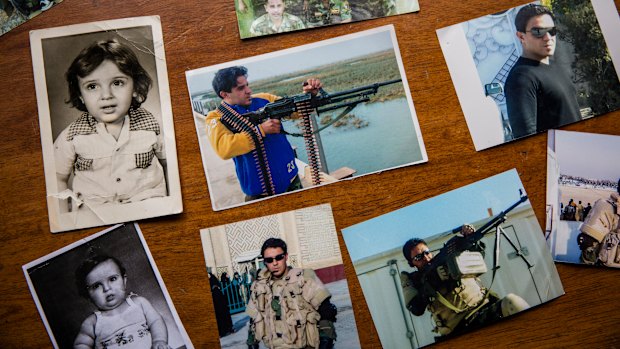 Photographs of Captain Harith al-Sudani are laid out at his family's home in Baghdad.