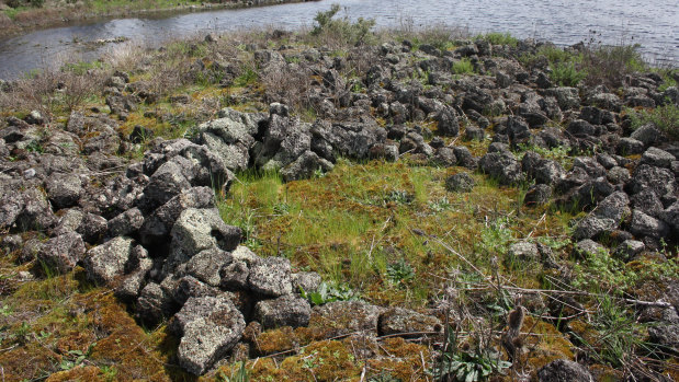 The remains of an ancient Indigenous stone house at Lake Condah, part of the Budj Bim landscape.