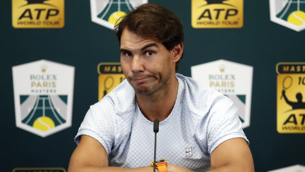Nadal addresses the media after his withdrawal from the Paris Masters.