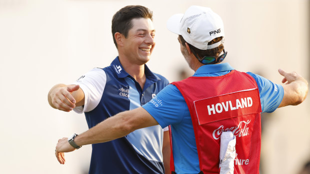 Viktor Hovland and Shay Knight celebrate the Tour Championship win.