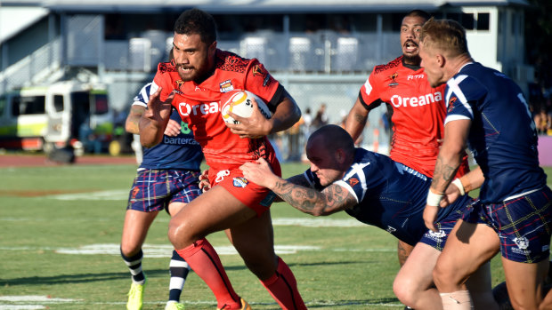 Strife: Tonga's Peni Terepo breaks the Scottish line during the 2017 Rugby League World Cup.