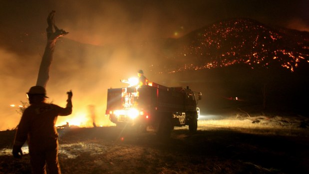 CFA members battle the Beechworth fires. 