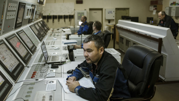 Staff members at the central control post aboard the Akademik Lomonosov, a floating nuclear power plant in Murmansk, Russia.