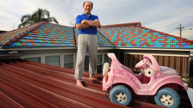 John Hall painted the roof tiles on his Sans Souci home so his late wife Berta could "see it better from heaven".