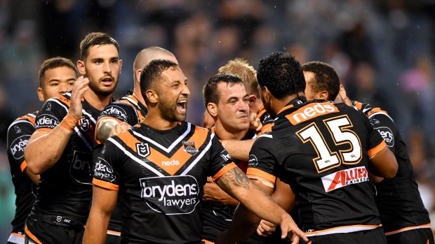 Vintage display: Benji Marshall and the Tigers celebrate a try.