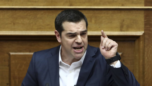 Greece's Prime Minister Alexis Tsipras delivers his speech during the parliamentary debate.