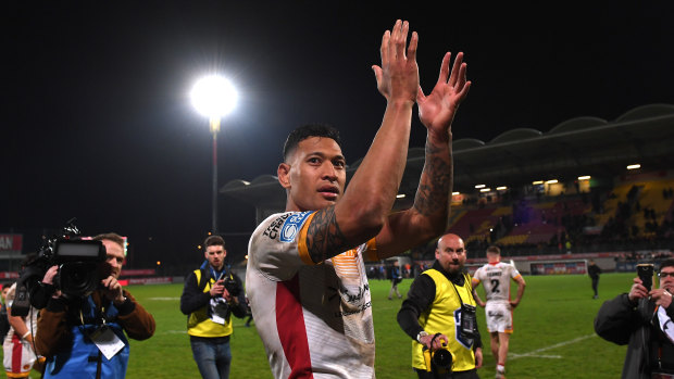 Israel Folau applauds Catalans Dragons fans after the match at Stade Gilbert Brutus in Perpignan.