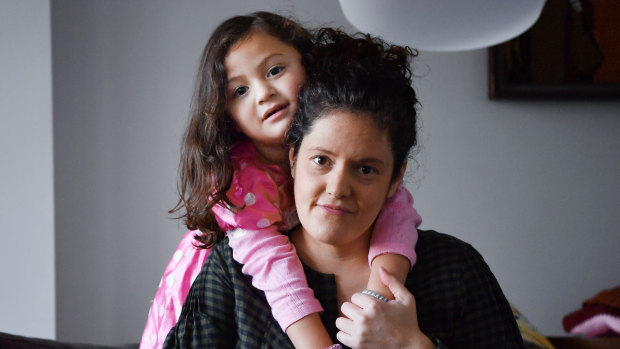 Shella Shpigel, pictured with daughter Paloma, is concerned about a proposal to hand over council-run child care centres to not-for-profit providers in the City of Port Phillip.