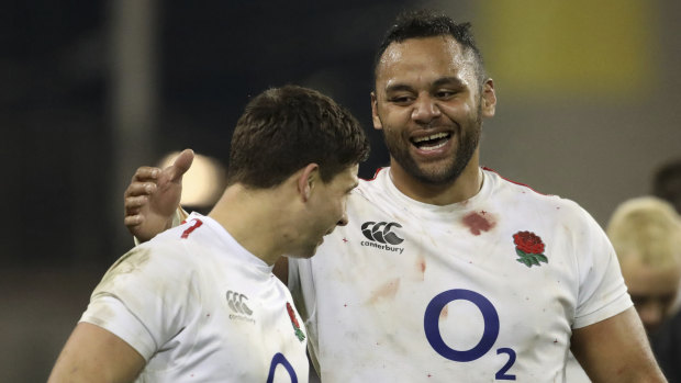 Momentum: England's Billy Vunipola (right) celebrates with teammate Ben Youngs after the win against Ireland.