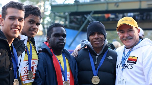 The original IMP team after finishing the New York City marathon in 2010, l-r: Joseph Davies, Caleb Hart, Juan Darwin, Charlie Maher and Rob de Castella.