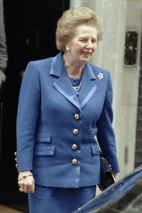 After a long night of discussions, Margaret Thatcher leaves Downing Street for an audience with the Queen after handing in her resignation.