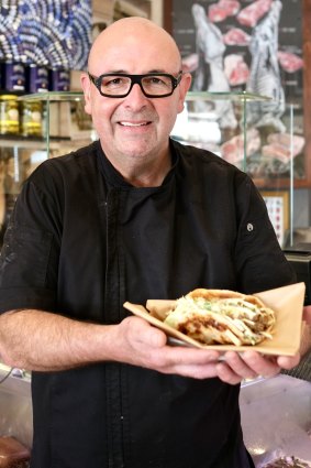David Torre with one of his rendang tacos. 