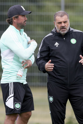 Harry Kewell with Celtic boss Ange Postecoglou.