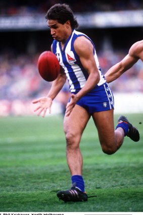 Phil Krakouer in action for  North Melbourne.