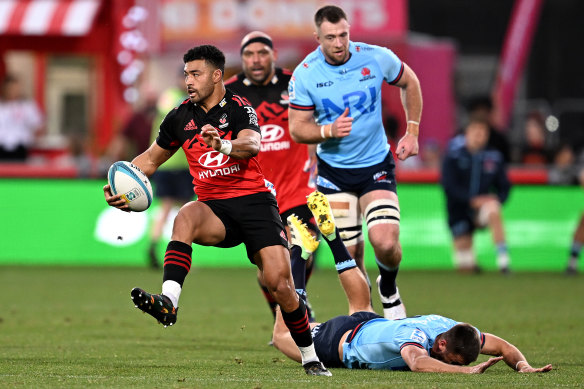 Richie Mo’unga skips away from the Waratahs.