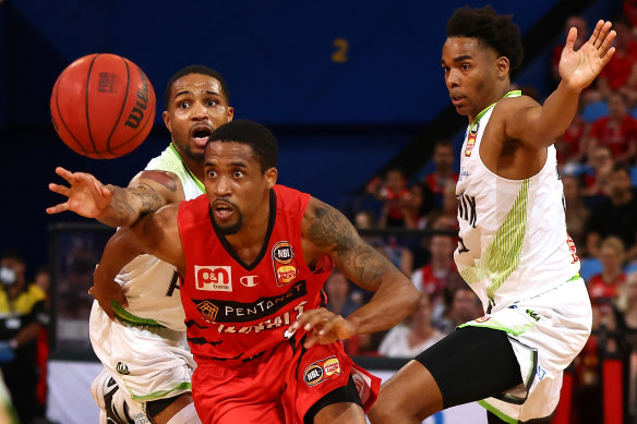 Perth star Bryce Cotton has all eyes for the ball against South East Melbourne Phoenix.