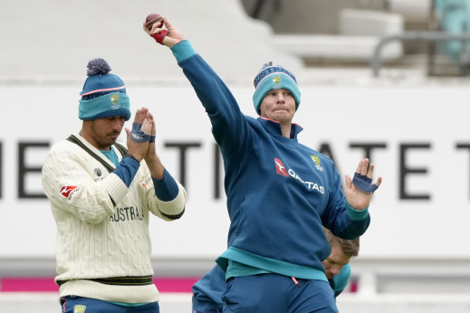 Steve Smith (right) trains at The Oval on Monday, alongside Usman Khawaja (left) and David Warner (right).
