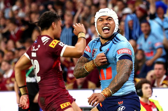 NSW winger Brian To’o celebrates after scoring a try.