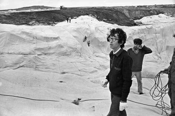 The artist Christo and his assistants during the "wrapping" of Little Bay on October 9, 1969. 