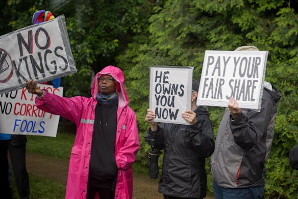 Demonstrators outside the dinner. 
