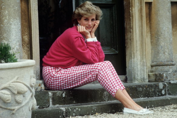 Diana sitting on a step at her home, Highgrove House in 1986, the year she met James Hewett.