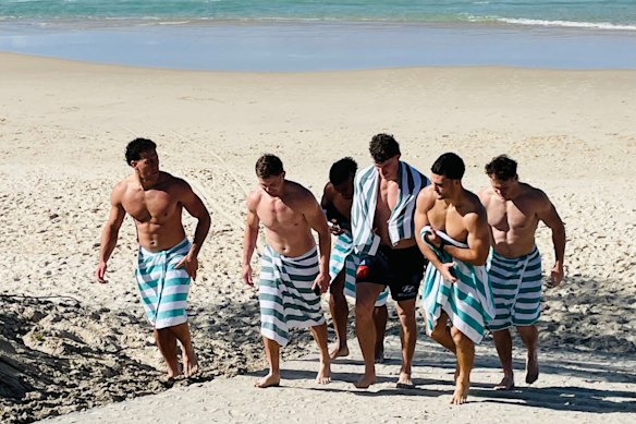 NSW Blues players enjoy a dip at Salt Beach on Wednesday.