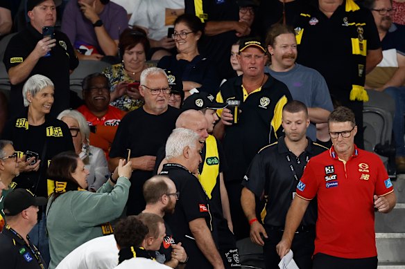 Damien Hardwick makes his way through the Tiger crowd.