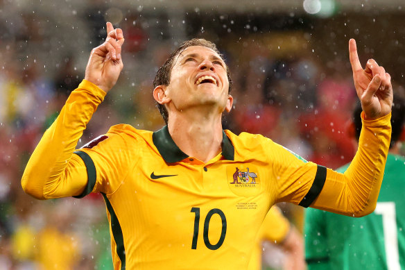 Craig Goodwin celebrates a goal.