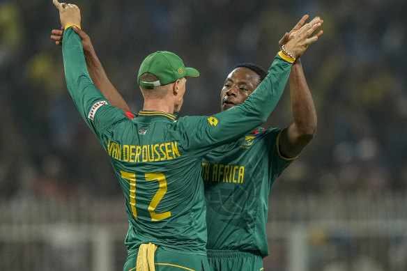 Rabada and van der Dussen celebrate his screamer.