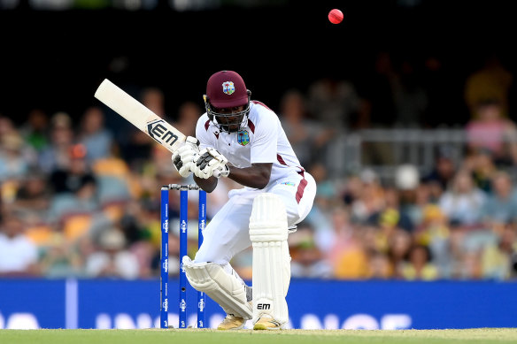 Kevin Sinclair steadies the ship for the West Indies.
