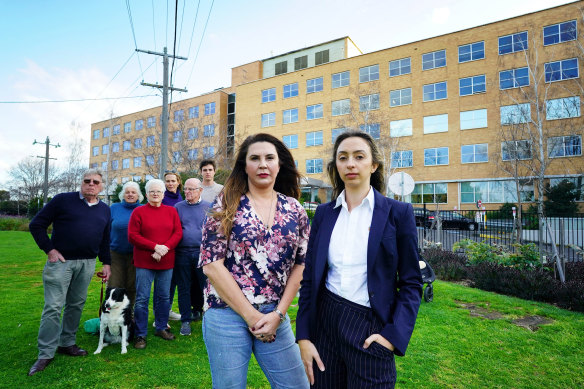 Stonnington Mayor Jami Klisaris and Deputy Mayor Melina Sehr with concerned locals outside Cabrini Malvern.