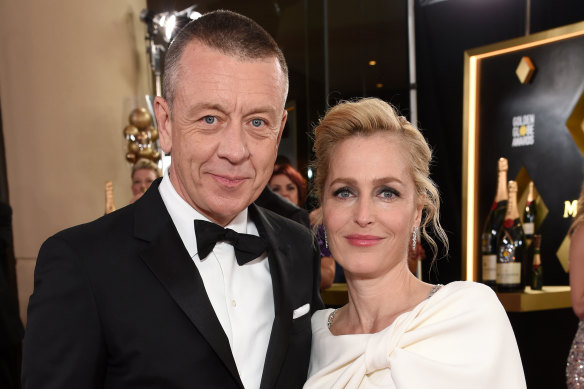 Gillian Anderson with partner and Crown creator Peter Morgan at this year's Golden Globe Awards.