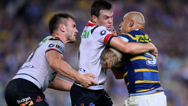 Keary aims up with the Eels' Blake Ferguson during the Roosters win on Friday night. 