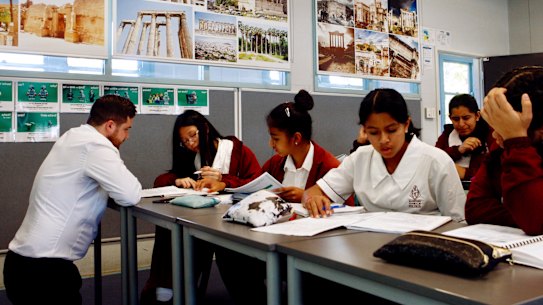 Blacktown Girls High School teacher Lance Shortus with his year 8 Latin language class.